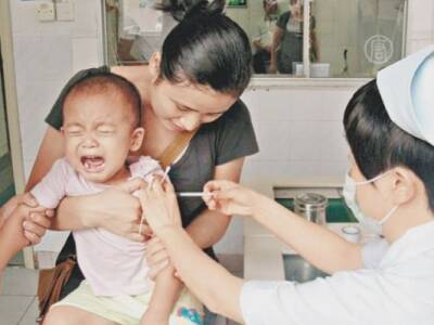 Более 140 млн детей от трех до 11 лет привили от коронавируса в Китае - eadaily.com - Китай