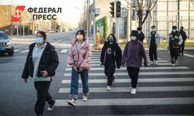 В Китае нарушителей антиковидных законов провели маршем позора - fedpress.ru - Китай