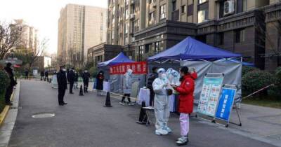 Жителям китайского Сианя запретили покидать дома из-за коронавируса - ren.tv - Китай - Сиань
