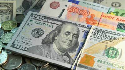 «Достойный результат»: как менялся курс рубля в 2021 году - russian.rt.com