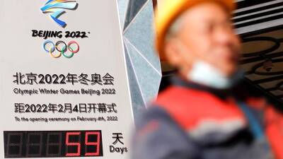 Доминик Рааб - В Великобритании пообещали рассмотреть вопрос о бойкоте Олимпиады в Китае - iz.ru - Англия - Китай - Израиль - Новая Зеландия