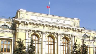 Банк России понизил официальные курсы доллара и евро на 2 февраля - riafan.ru - Россия - Москва
