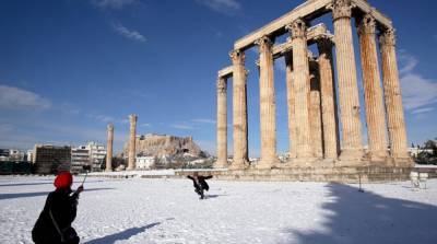 В Афинах из-за снегопада отложили COVID-вакцинацию - ru.slovoidilo.ua - Украина - Греция - Эмираты - Афины
