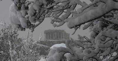 В Афинах прервали вакцинацию из-за снегопада: нет света, не ходит транспорт (фото) - focus.ua - Греция