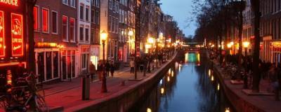 Мэр Амстердама планирует ликвидировать в центре города квартал красных фонарей - runews24.ru - Голландия - Амстердам