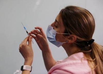 Количество вакцинированных от COVID-19 американцев превысило число инфицированных в стране - Bloomberg - unn.com.ua - Сша - Киев