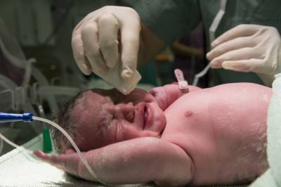 У новорожденного обнаружили аномальное количество частиц коронавируса - news.bigmir.net - Сша - Вашингтон - Колумбия - Washington