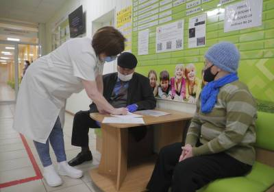 В Киеве женщину парализовало после вакцинации от COVID-19 - news.bigmir.net - Киев