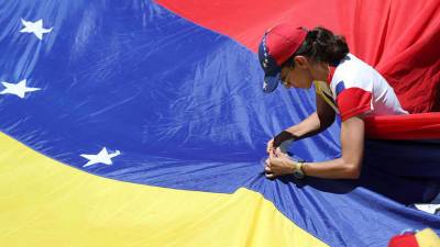 В Венесуэле минимальный размер оплаты труда подняли до $2,5 - gazeta.ru - Венесуэла