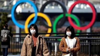 Есихидэ Суг - Японские депутаты потребовали отменить Олимпиаду - vesti.ru - Токио