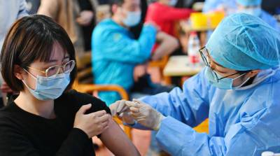 Чжун Наньшань - От коронавируса к концу 2021 года будут привиты 80% жителей Китая - belta.by - Китай - Минск