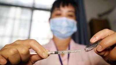 Чжун Наньшань - В Китае сделали 621 млн прививок от ковида - vesti.ru - Китай