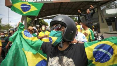 Бразильцы вышли на протесты против президента из-за 500 000 смертей от Covid-19 - eadaily.com - Президент
