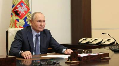 Владимир Путин - Путин анонсировал введение единого базового оклада для медработников в РФ - iz.ru - Россия - Израиль