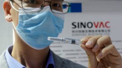 Китай угрожал Украине заблокировать поставку COVID-вакцин — AP - agrimpasa.com - Украина - Китай - Канада - Женева - Киев