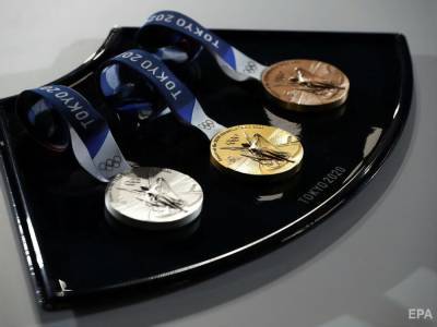 Томас Бах - На Олимпиаде спортсмены будут сами себе надевать медали, рукопожатия и объятия отменят - gordonua.com - Украина - Токио