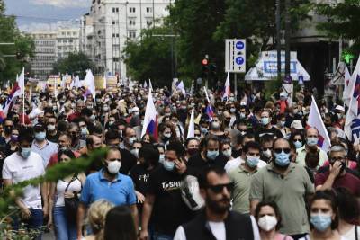 Противники вакцинации от COVID-19 устроили масштабные протесты в Греции и мира - cursorinfo.co.il - Франция - Греция