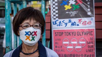 Хроники коронавируса: французы митингуют, Япония готовится к Играм - vesti.ru - Франция - Япония