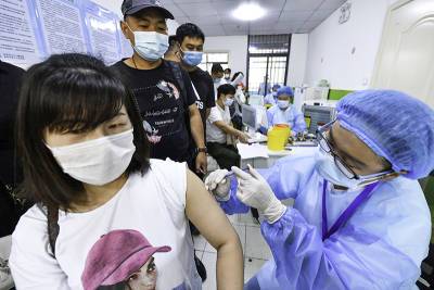 В Китае сделали 1,45 миллиарда прививок от коронавируса - tvc.ru - Китай