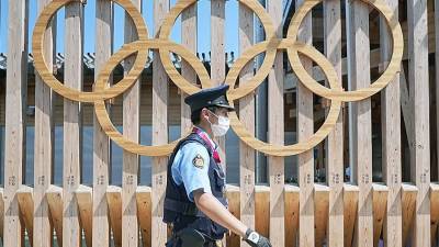 В Японии за сутки у девяти задействованных на Олимпиаде выявлен COVID-19 - iz.ru - Япония - Израиль - Токио