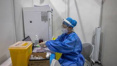 Юань Чжимин - Китайские ученые: коронавирус не создавался в лаборатории - vesti.ru - Уханьск