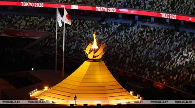 РЕПОРТАЖ: Олимпийский огонь зажжен на новом Национальном стадионе в Токио - belta.by - Белоруссия - Токио