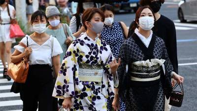 В Японии выявили новый суточный максимум заболевших COVID-19 - iz.ru - Япония - Израиль - Токио