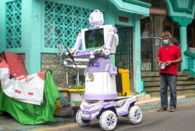 В индонезийской деревне из ненужного хлама собрали робота, помогающего больным COVID-19 - enovosty.com - Индонезия