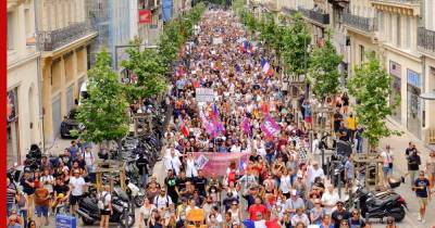 Во Франции около 215 тысяч человек протестовали против коронавирусных ограничений - profile.ru - Франция - Париж