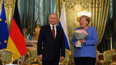 Владимир Путин - Ангела Меркель - В Китае сделали выводы о характере Путина по подаренному Меркель букету - iz.ru - Россия - Китай - Германия - Израиль