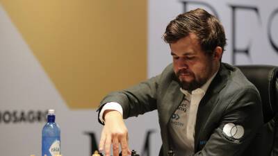 Фабиано Каруан - Магнус Карлсен - Даниил Дубов - Карлсен досрочно выиграл шахматный супертурнир в Вейк-ан-Зее - russian.rt.com - Россия - Голландия - Норвегия