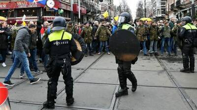 В Амстердаме между полицией и митингующими произошли столкновения - obzor.lt - Амстердам